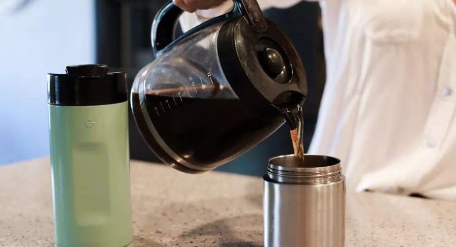 https://www.hmbottles.com/wp-content/uploads/2022/11/Can-you-put-hot-coffee-in-a-plastic-water-bottle.jpeg